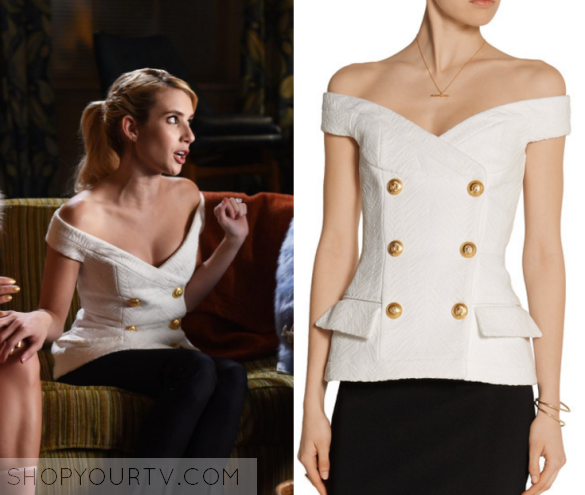 Chanel's white jacket and skirt set with black trim and gold buttons on  Scream Queens